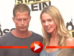 Til Schweiger und Svenja Holtmann kuscheln auf dem roten Teppich