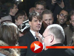 Tom Cruise schreibt Autogramme bei der Premiere von Löwen und Lämmern